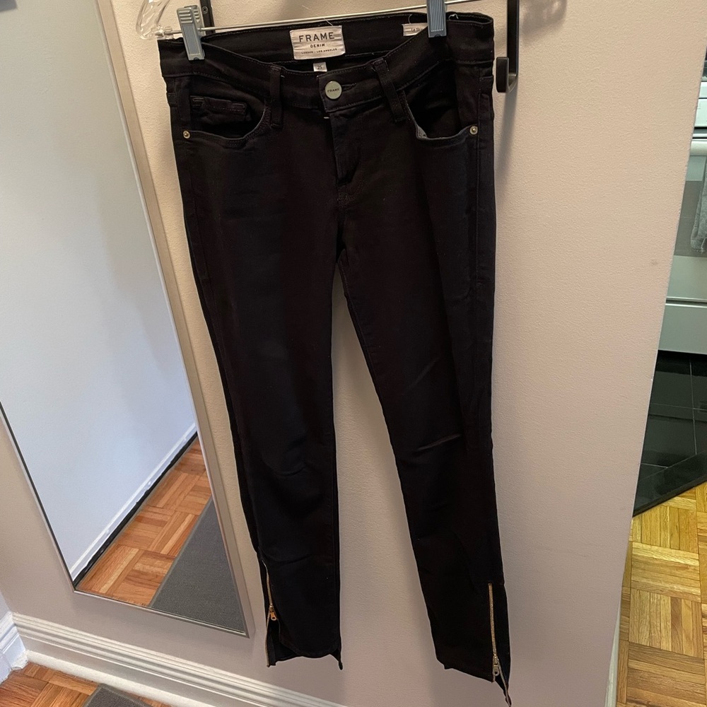 Black Frame skinny jeans with gold zipper